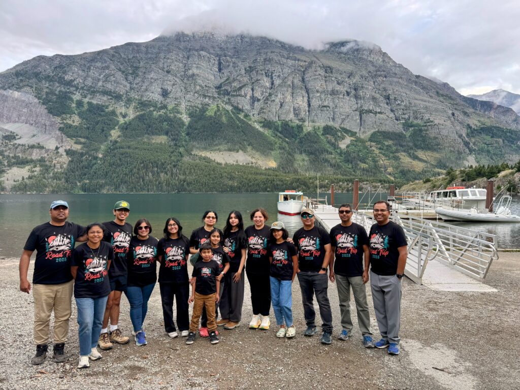 Group photo of 14 family members, wearing matching Book Blabber T-shirts.